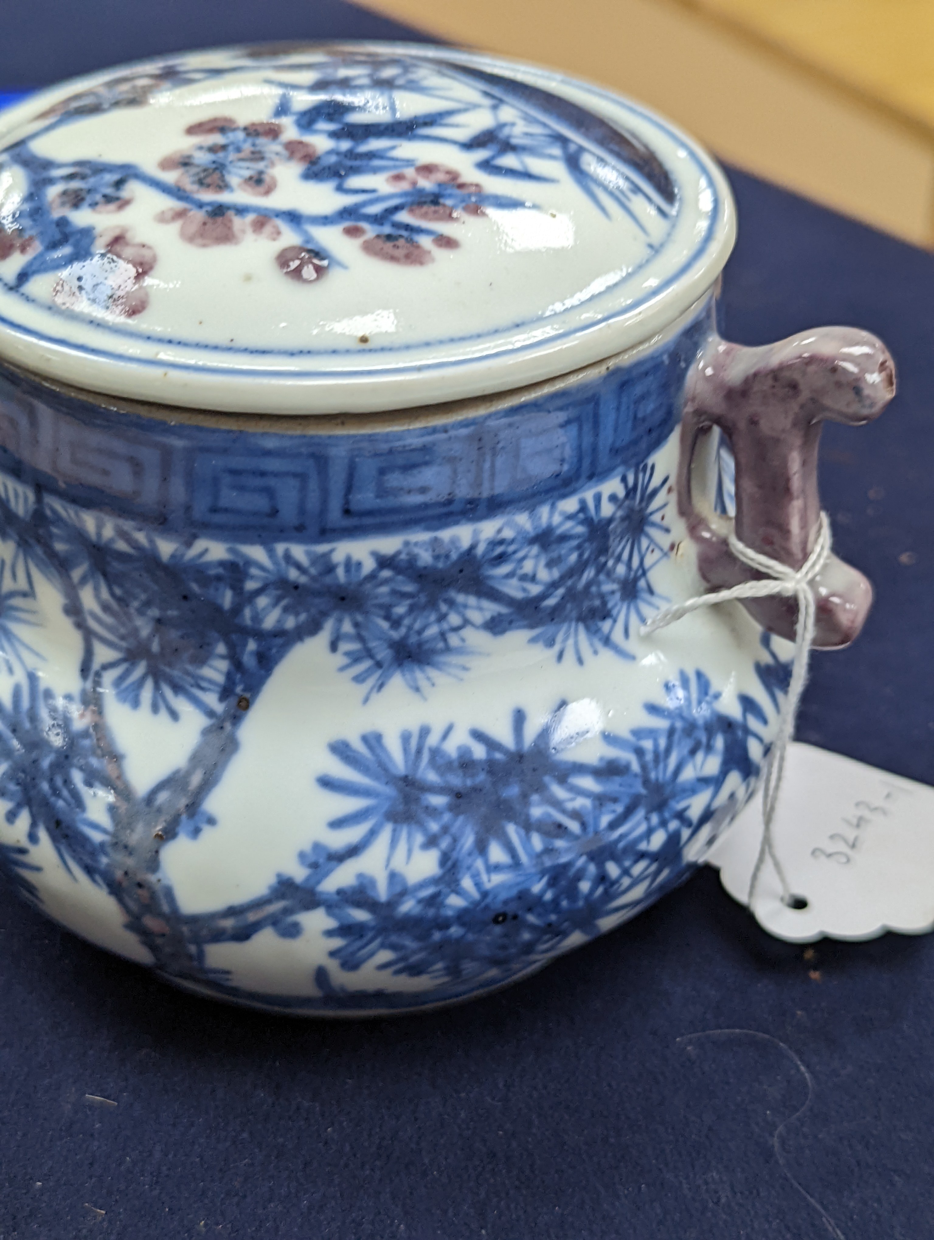 A Chinese underglaze blue and copper red jar and cover, Xuande six character mark but later 12cm
